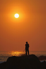 silhouette of a person on a beach