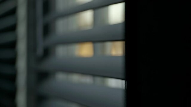 Close up open blinds moving eerie close up slow motion