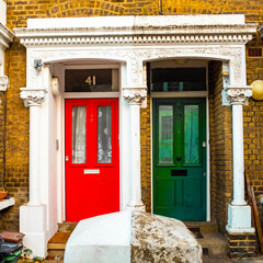 Fototapeta na wymiar green and red house door