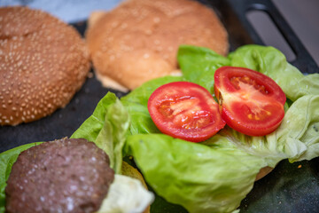 Delicious burger prepared with fresh ingredients at home