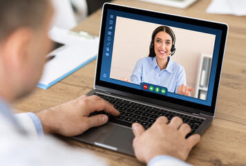 Teleconference Concept. Businessman Talking With Female Manager Via Video Call On Laptop