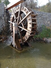Fototapeta na wymiar old mill wheel