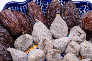 dried figs sprinkled with rice flour and medjoul jumbo dates.