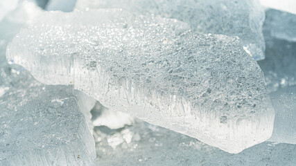 Stacks of drift ice piled up against the dutch coast with crystal clear sunlight © fotografiecor