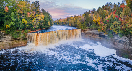 Beautiful morning dawn at Upper Tahquamenon Falls in Autumn - Michigan State Park in the Upper Peninsula - waterfall
