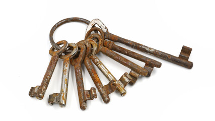 bunch of old rusty keys on white background