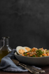 Ready to eat beans salad on grey background, space for text. Healthy nutrition concept