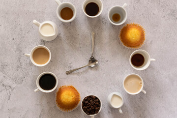 Obraz na płótnie Canvas Coffee clock on table, coffee break with some muffins