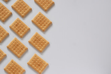 Obraz na płótnie Canvas Sweet biscuits on white background with space for text