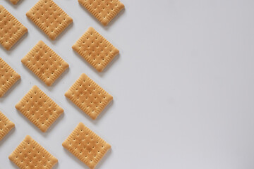 Sweet biscuits on white background with space for text