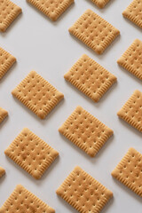 Sweet biscuits pattern on white background
