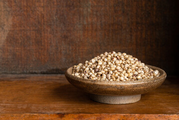 Uncooked Sorghum Seeds in a Bowl