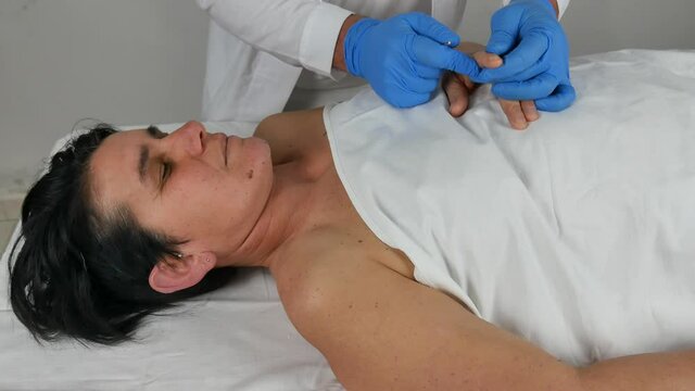 close-up of a corpse being autopsied possibly deceased from covid-19