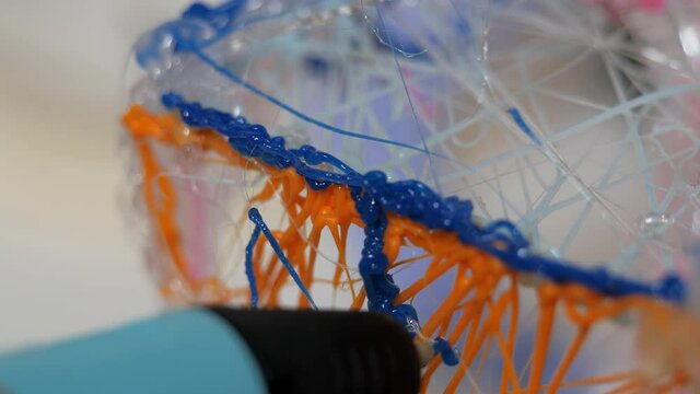 3D pen in a child's hand.