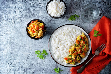 Curry chicken with rice in a plate