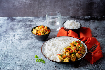 Curry chicken with rice in a plate