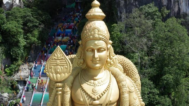 Flight over scenic Lord Murugan Statue  (Batu caves)