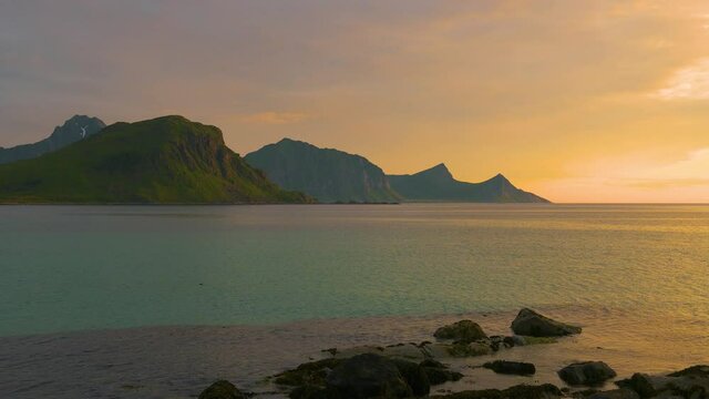 Sunset over the mountains and the sea of Lofoten Islands, Norway