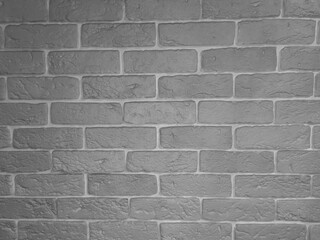 Obraz premium Black and white background image in the form of plaster bricks, photo background, with space for text