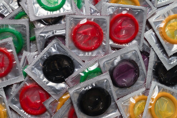 Colorful condoms background.