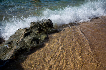 Sea sandy beach and waves
