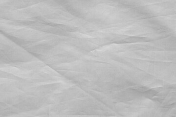 Texture of white fabric with small folds