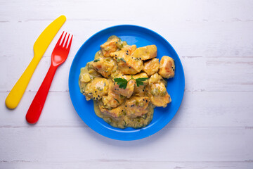 Chicken cooked with coconut milk and curry.