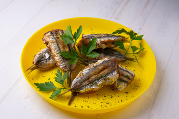 Traditional spanish tapa: Boquerones rellenos de málaga con perejil.