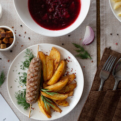 Borsch with sour cream and onions, lula with French fries