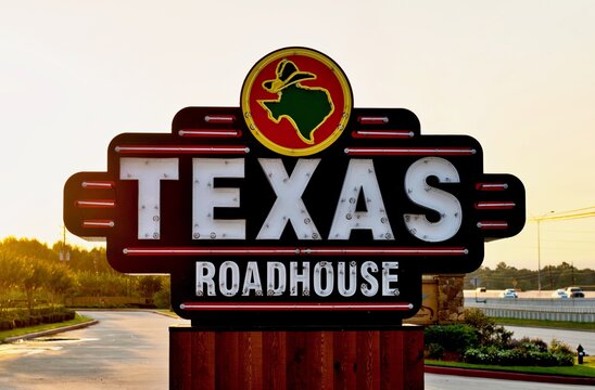 Humble, Texas USA 09-06-2019: Texas Roadhouse Restaurant Sign On A Freeway In Humble, Texas.