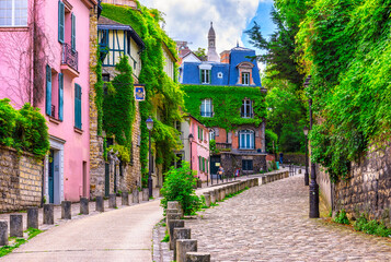 Cozy street in quarter Montmartre in Paris, France