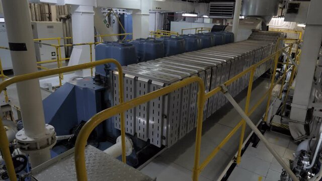 Close to four stroke diesel engine in engine room of ship