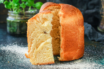 Easter cake and Easter eggs festive table traditional decor and treats. Happy easter holiday on the table meal outdoor top view copy space  food background rustic