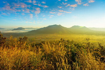 Fototapeta na wymiar Fog over Phu Thok Mountain at Chiang Khan ,Loei Province in Thailand.
