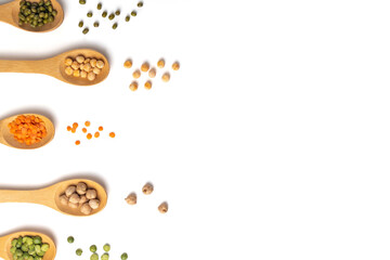 Legumes food background: chickpeas, red lentlis, mung bean, yellow peas and green peas. Copy space.