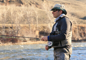 Fototapeta premium fly fisherman fishing on the Salmon River in Idaho, USA