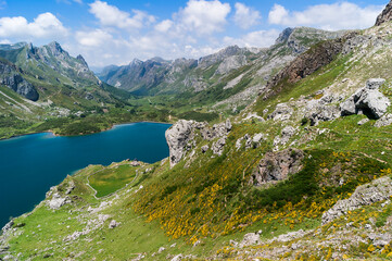 Naklejka na ściany i meble Photo taken in summer in the Lake of the Valley Natural Park, which is also a Biosphere Reserve.This beautiful and simple route starts from the town called Lake Valley in Somiedo, Asturias, Spain.