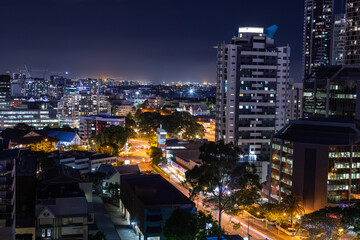 Fototapeta na wymiar The illuminated skyline of Brisbane at night
