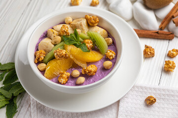 Dessert with oranges, mousse and popcorn
