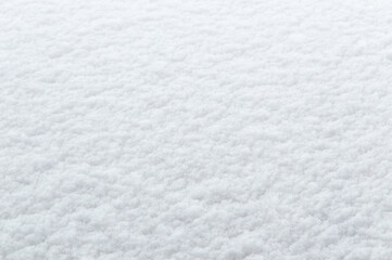 winter background: fresh clean even snow, large snowflakes