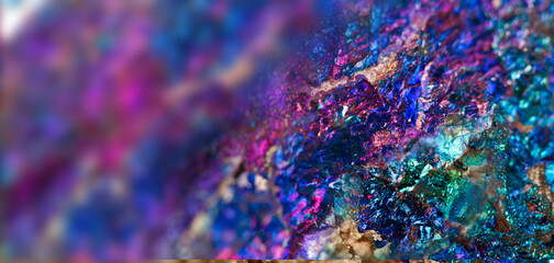 Copper pyrite. Mineral chalcopyrite. Texture minerals. Beautiful natural color purple background. Macro. Extreme closeup beautiful jewel background. Small focus size.