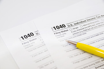 tax forms 1040 on white
