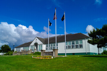 Newport, Oregon, USA, June 10, 2020, Newport City Hall. City hall building. An old wooden office building.