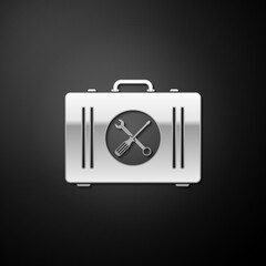 Silver Toolbox icon isolated on black background. Tool box sign. Long shadow style. Vector.