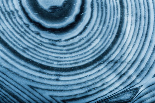 macro photo of contrast agate blue dark and light lines