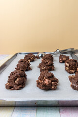 uncooked chocolate chip cookies baking background 