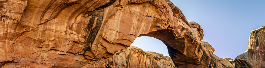 Close up of sandstone arch against blue sky in Capitol Reef national park in Utah, america