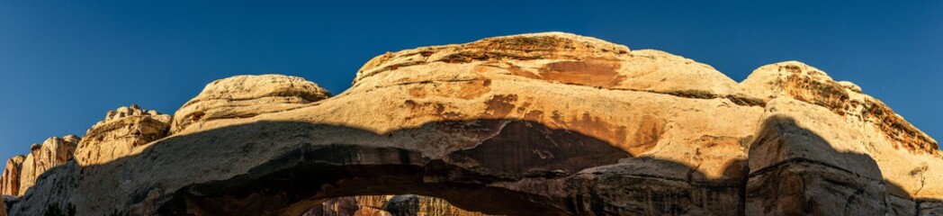 Close up of sandstone arch against blue sky in Capitol Reef national park in Utah, america