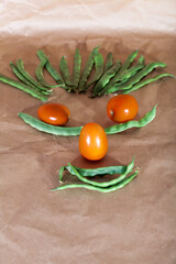 Naklejka na ściany i meble green beans and cherry tomatoes forming one side