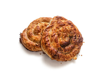 Two fresh golden-crusted pies, coiled on a white background